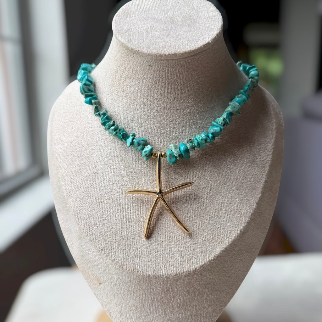 Gold starfish necklace