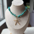 Gold starfish necklace