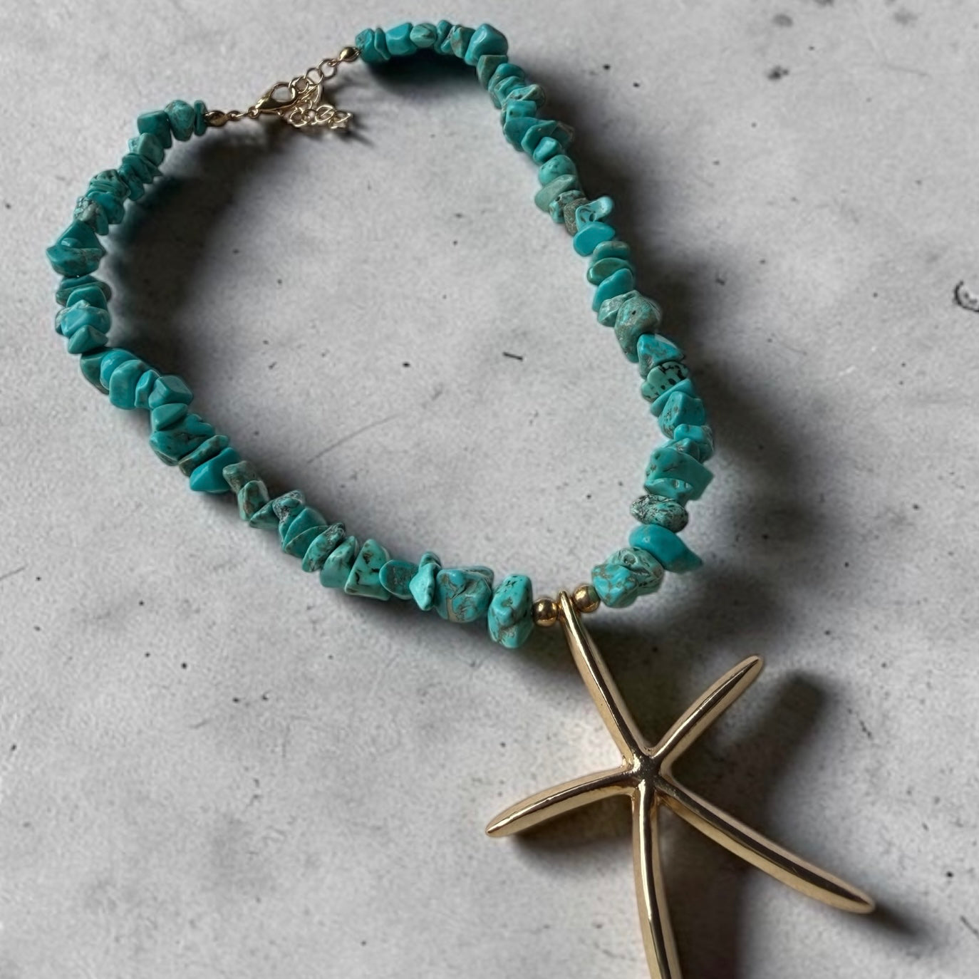 Gold starfish necklace