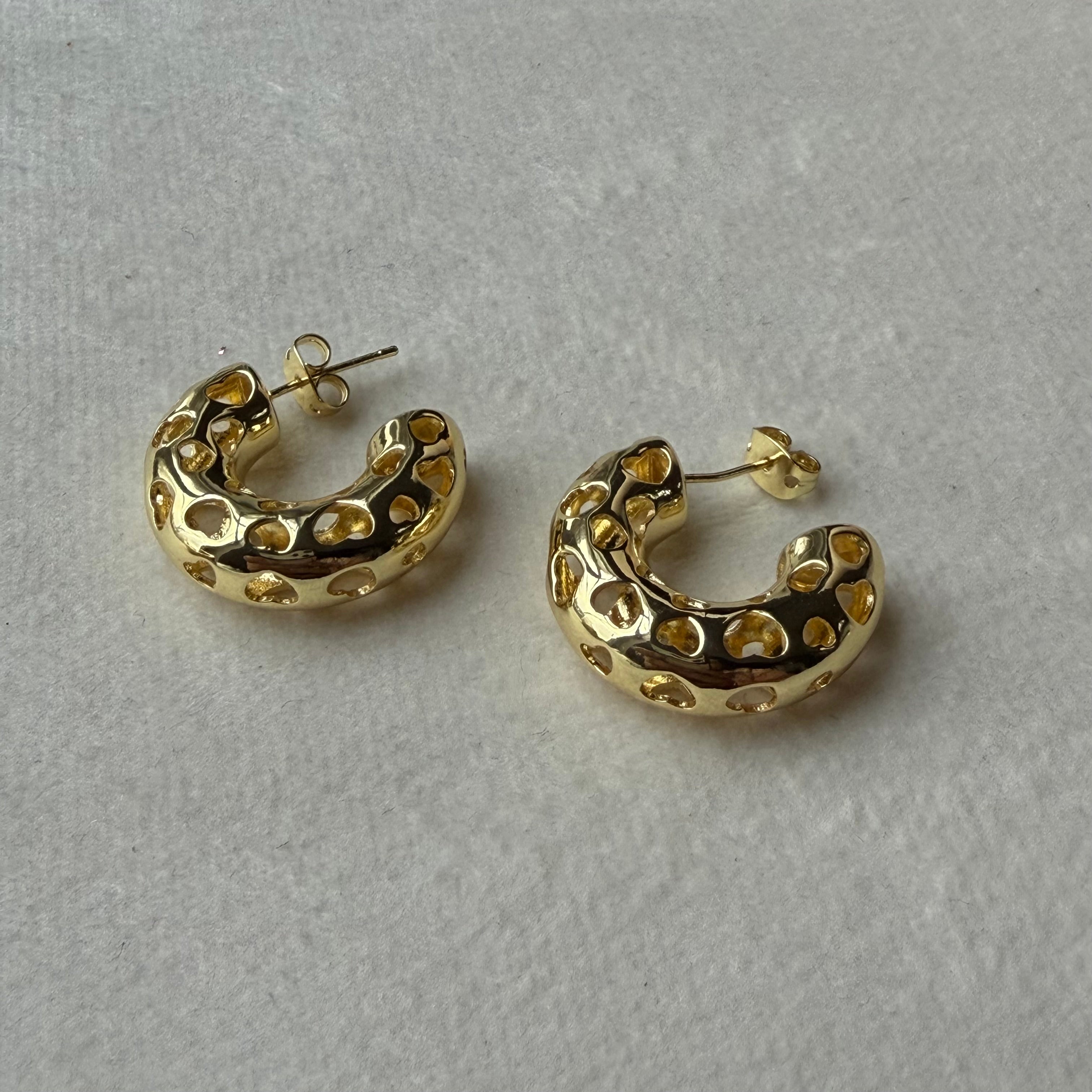 Médium argollas, earring.